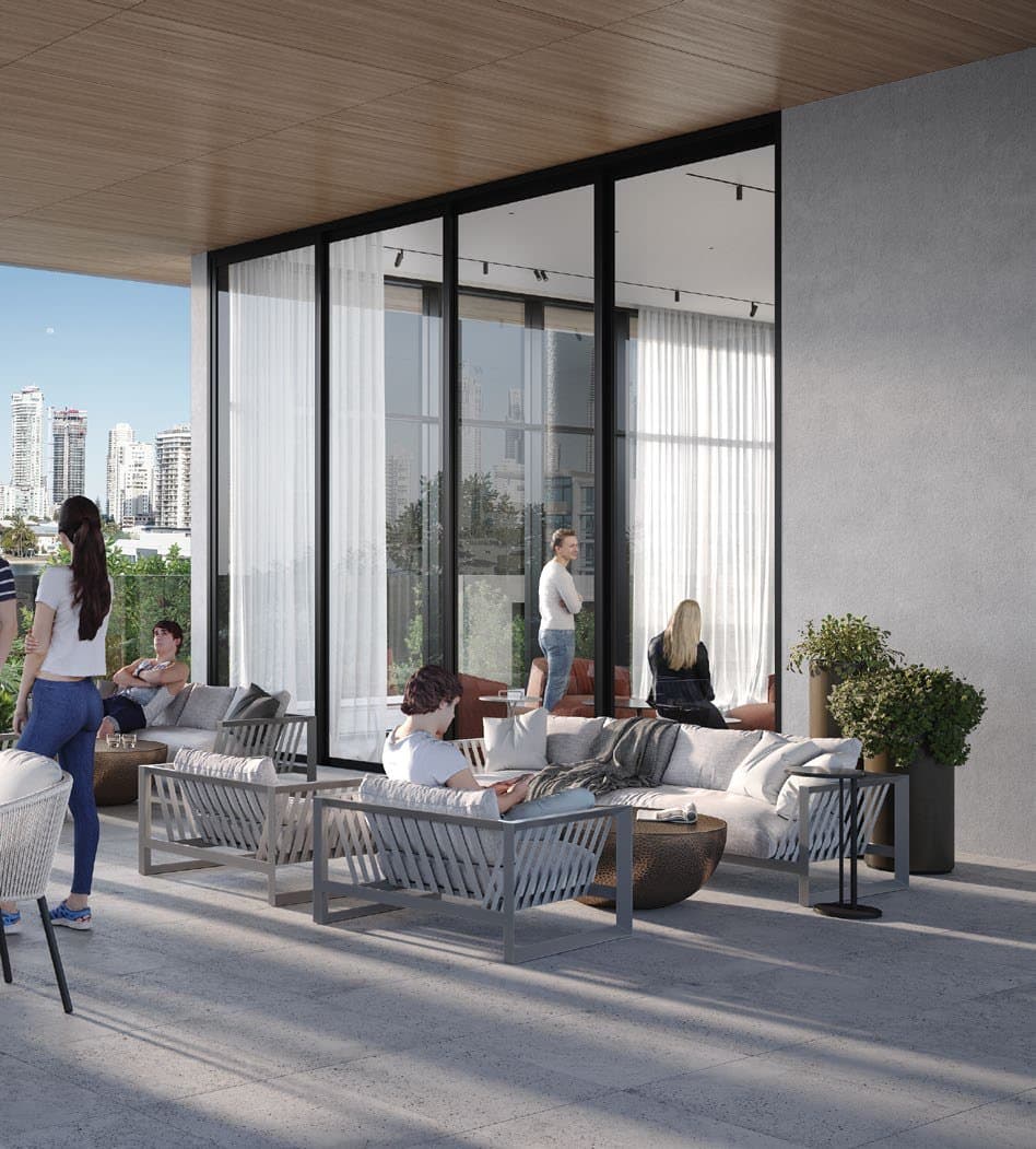 Residents on the communal terrace overlooking the city